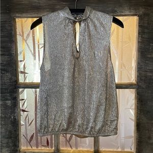 Women’s gold shimmery party top